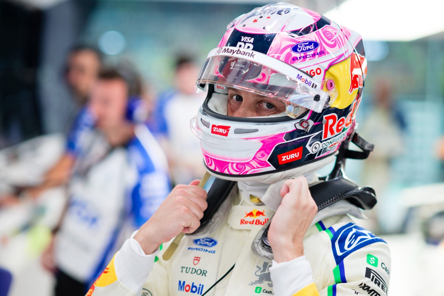 Racing Bulls driver Liam Lawson get ready in the garage for the F1 Sprint at the 2026 Singapore Grand Prix