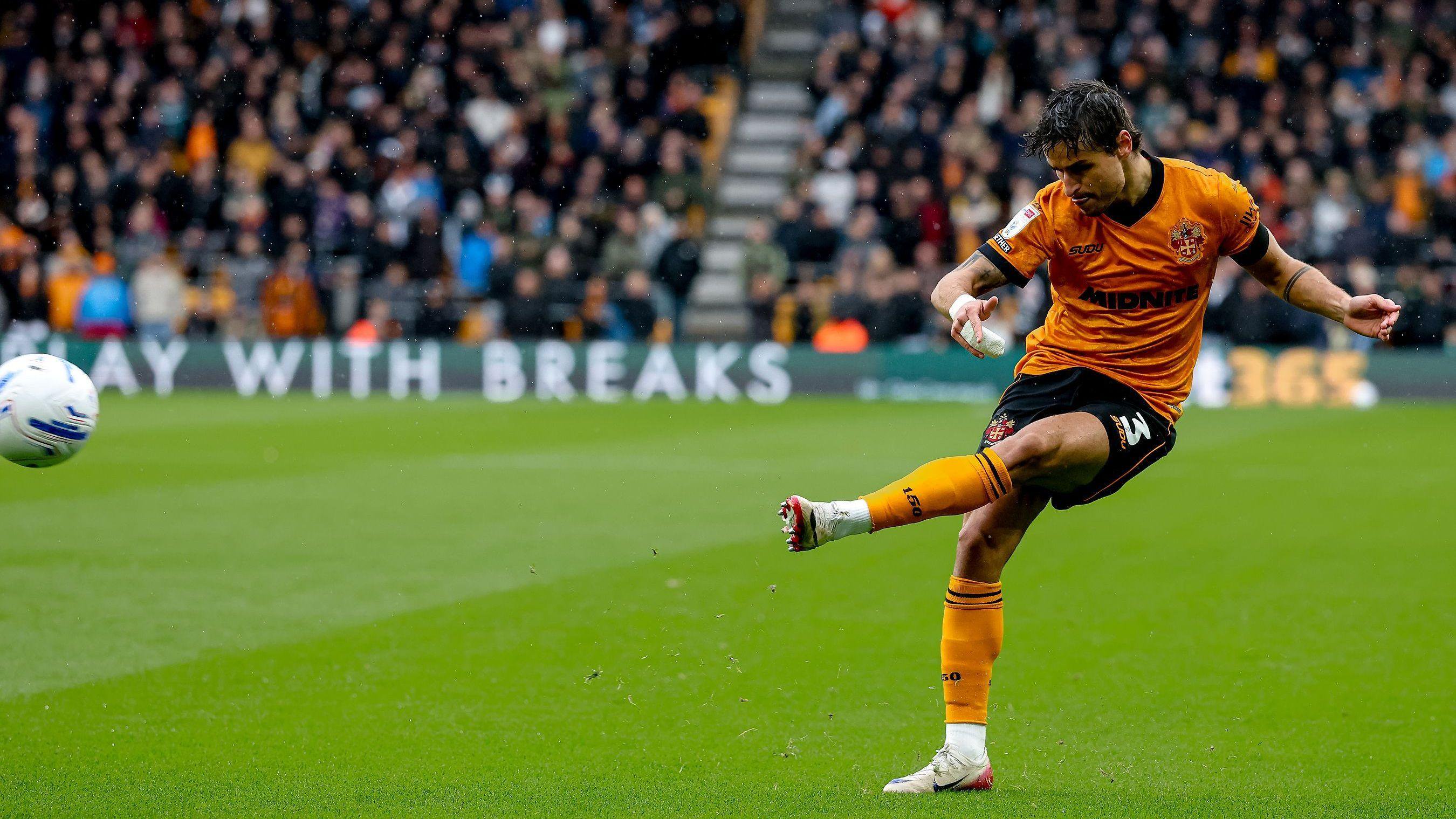 Hugo Bueno crosses the ball during Wolverhampton Wanderers' Championship match against Watford on Saturday