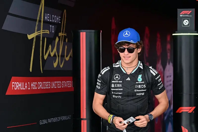 Kimi Antonelli walks into the Austin paddock