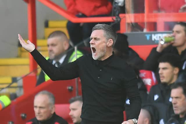 Graham Alexander on the touchline at the Racecourse Ground