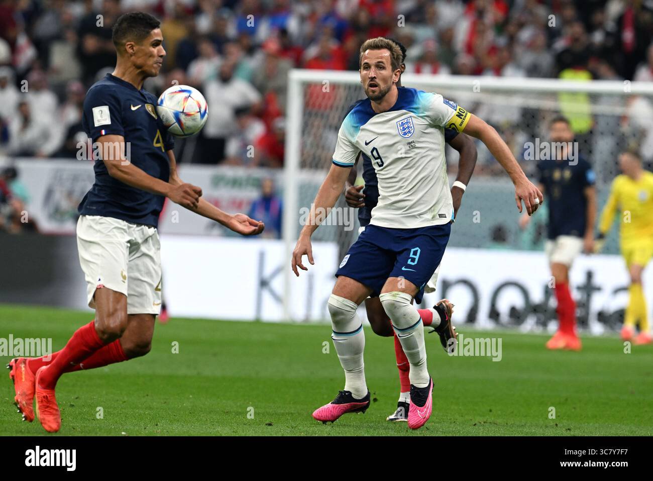 Harry kane looks on as france handles the football during the qatar world cup quarterfinal between france and england