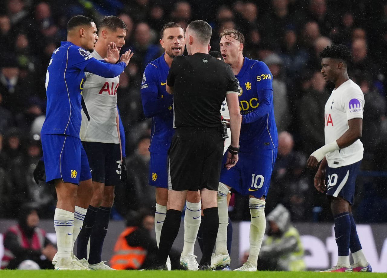 Cole Palmer is shown a second yellow card