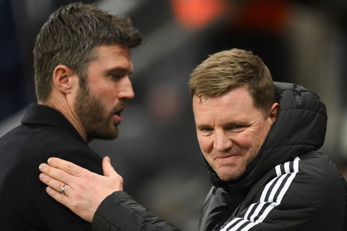 Michael Carrick and Eddie Howe interacting