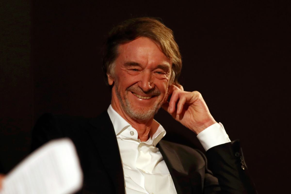 INEOS Founder and Chairman Sir Jim Ratcliffe (L) reacts during a press conference regarding INEOS and Mercedes future partnership at The Royal Automobile Club