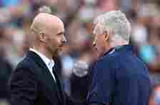West Ham United's manager David Moyes (right) greets Manchester United's manager Erik ten Hag during the Premier League match between West Ham Unit...