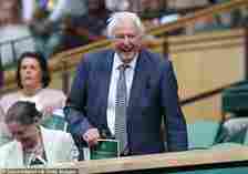 Sir David Attenborough enters the Royal Box on day one of the Wimbledon championships