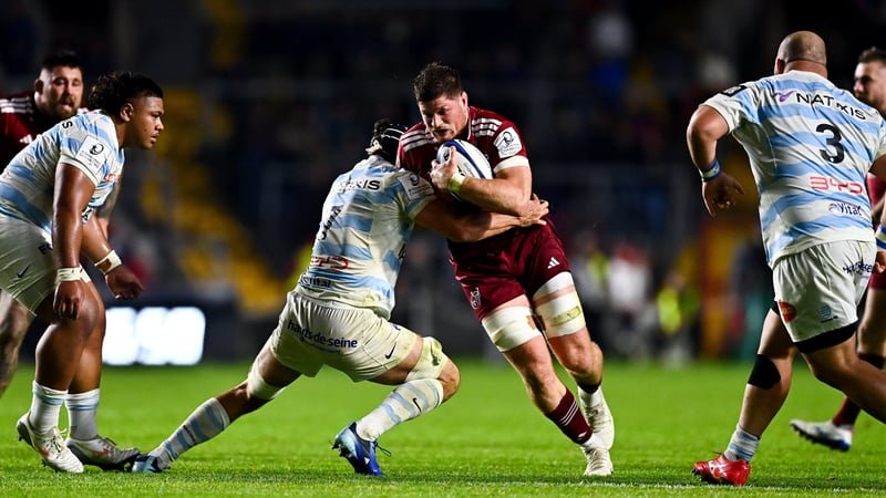 Jack O'Donoghue of Munster in action against Nicolas Martins of Racing 92 - Champions Cup, October 2026