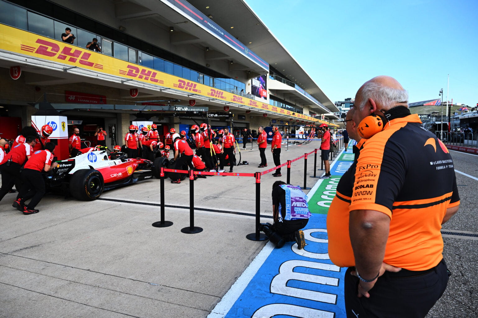 McLaren chief designer Rob Marshall looks at Ferrari's upgrades in the 2026 F1 United States Grand Prix pit lane