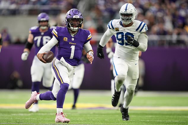 Minnesota Vikings quarterback Kyler Murray (1) runs against Indianapolis Colts defensive tackle DeForest Buckner (99) during the second half of an NFL football game in Minneapolis, Sunday, Oct. 25, 2026. (AP Photo/Ellen Schmidt)
