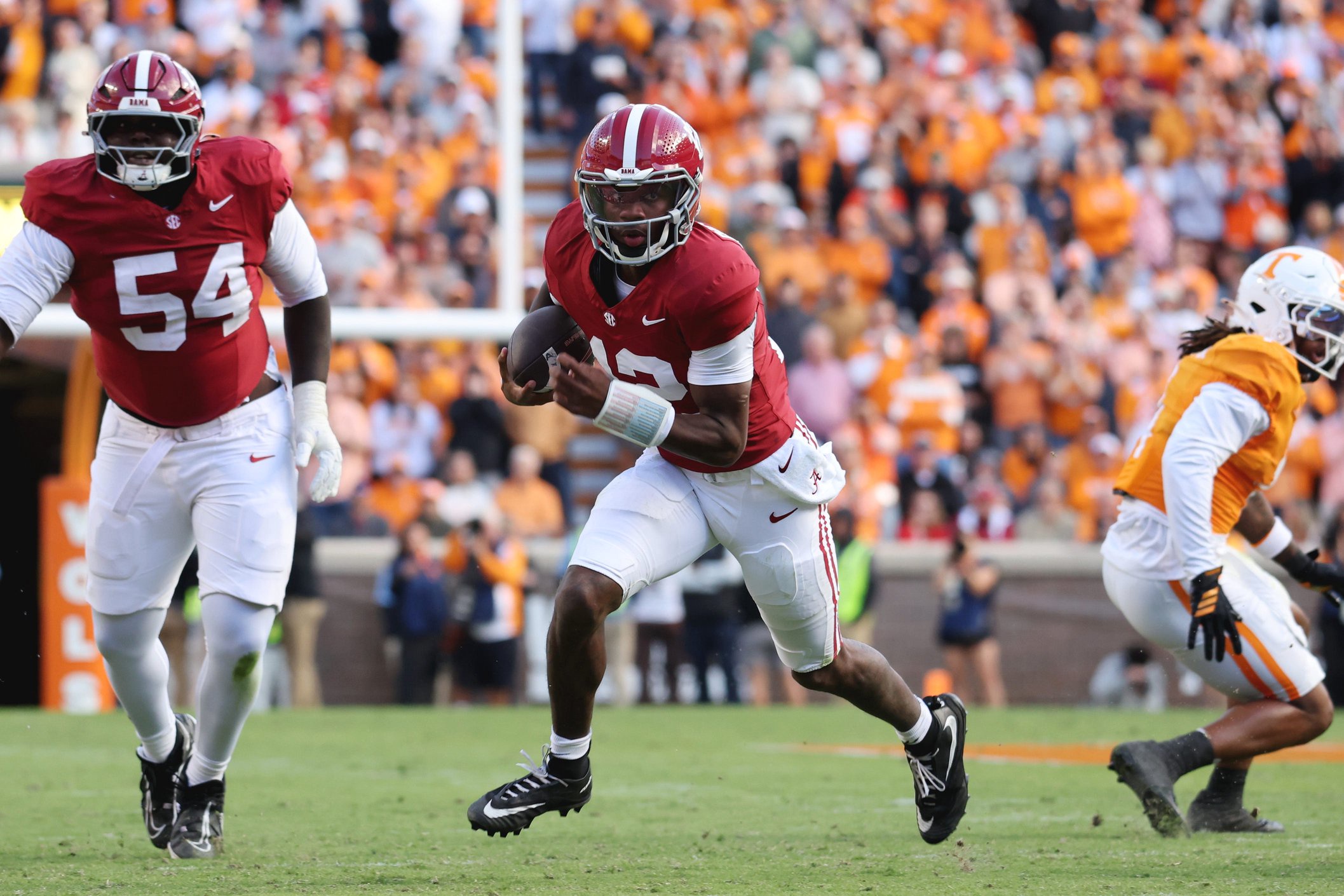 Oct 17, 2026; Knoxville, Tennessee, USA;  Alabama Crimson Tide quarterback Keelon Russell (12) runs against the Tennessee Volunteers during the first half at Neyland Stadium.  Mandatory Credit: Randy Sartin-Imagn Images