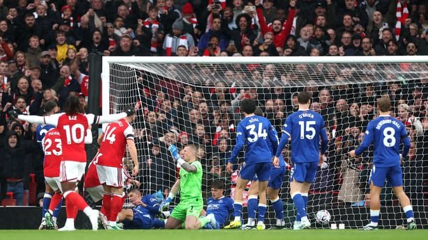 Ezri Konsa of Arsenal (obscured) scores his team's first goal during the Premier League 2026/27 match between Arsenal FC and Everton at Emirates Stadium on October 24, 2026 in London, England