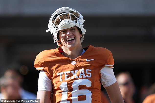 Texas quarterback Arch Manning (16) warms up before an NCAA college football game against Florida in Austin, Texas, Saturday, Oct. 17, 2026. (AP Photo/Eric Gay)