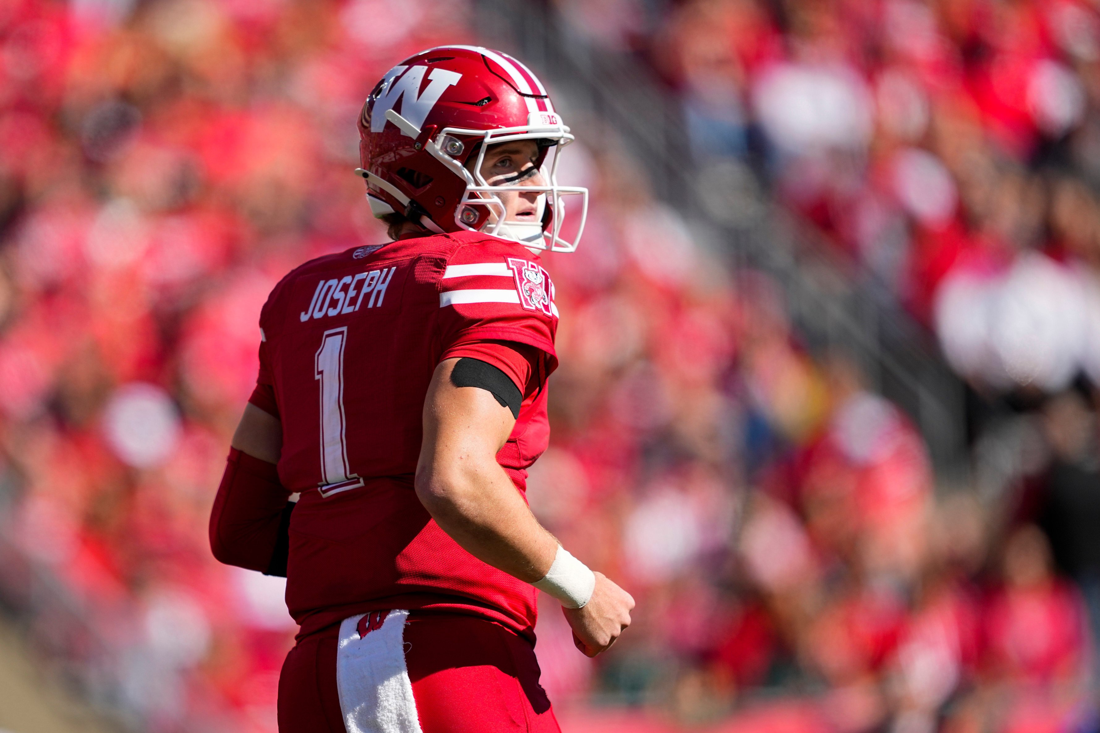 Oct 3, 2026; Madison, Wisconsin, USA;  Wisconsin Badgers quarterback Colton Joseph (1) looks to the sidelines during the third quarter against the Michigan State Spartans at Camp Randall Stadium. Mandatory Credit: Jeff Hanisch-Imagn Images