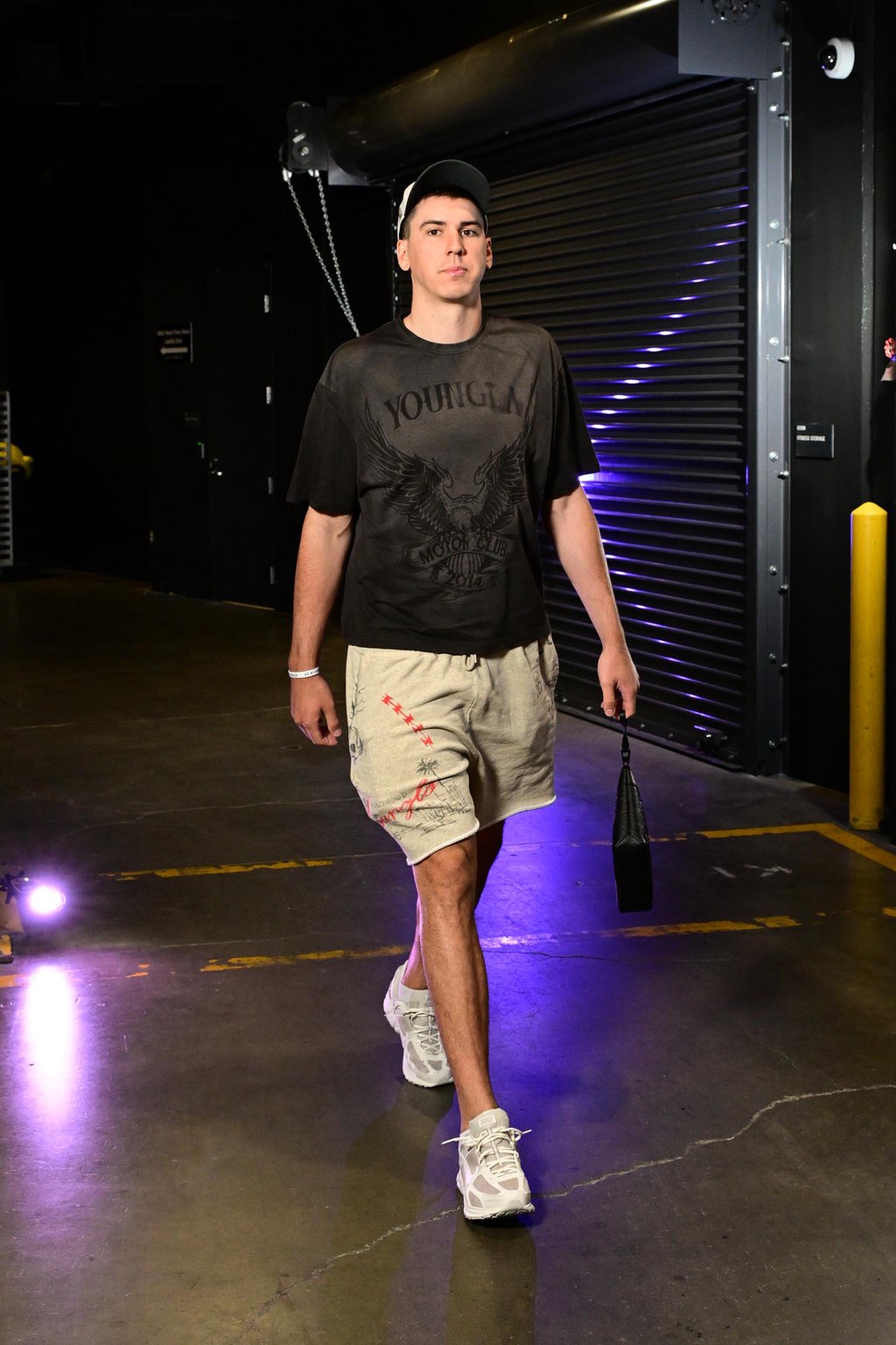 Jake LaRavia of the Los Angeles Lakers arrives at the arena.