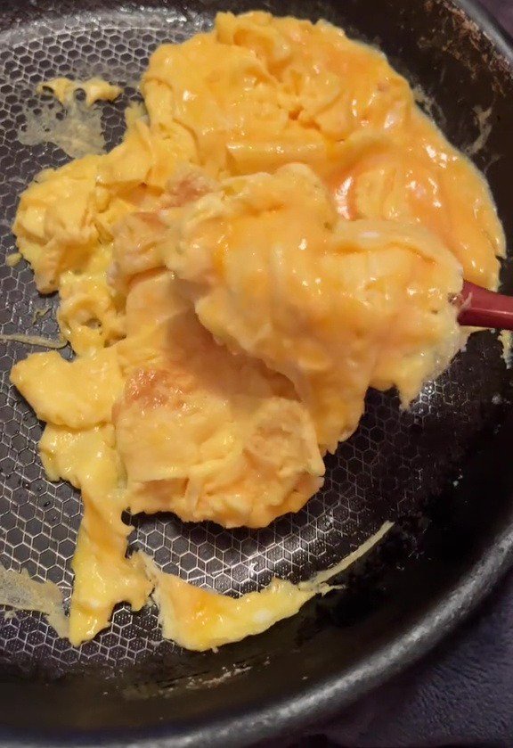 After a block of butter, she had 10 lightly scrambled eggs