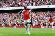 Bukayo Saka of Arsenal celebrates scoring a goal from the penalty spot during the Premier League match between Arsenal FC and AFC Bournemouth at Emirates Stadium on May 4, 2024