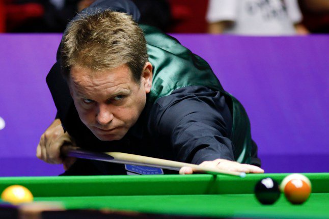 WUXI, CHINA - JULY 08: Joe Swail of Northern Ireland plays a shot during the group match between England and Northern Ireland on day six of 2017 Snooker World Cup quarter-finals at Wuxi City Sports Park Stadium on July 8, 2017 in Wuxi, Jiangsu Province of China. (Photo by Visual China Group via Getty Images/Visual China Group via Getty Images)