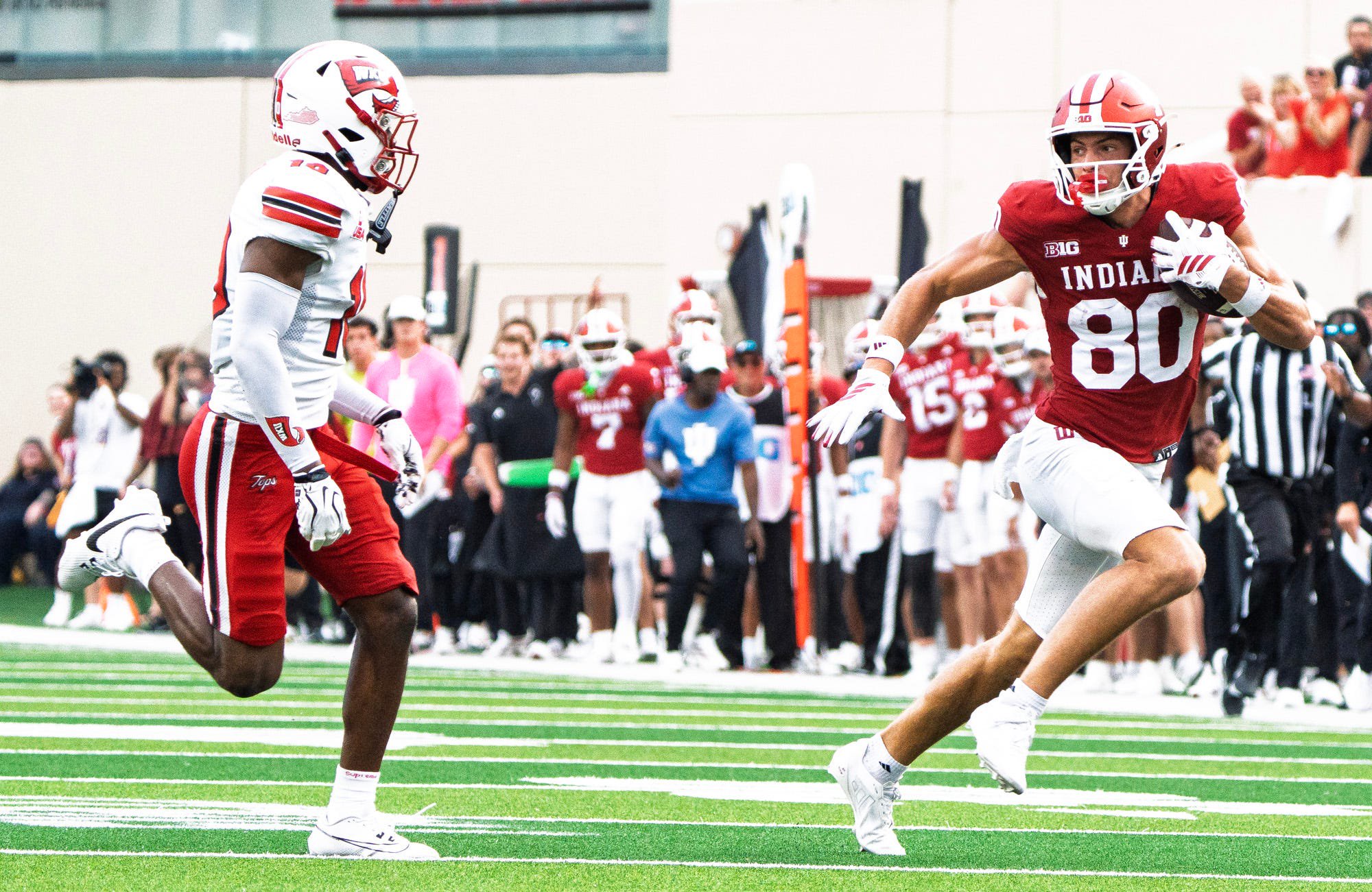 Indiana's Charlie Becker (80) runs for a touchdown during the Indiana versus Western Kentucky football game at Memorial Stadium on Saturday, Sept. 19, 2026.