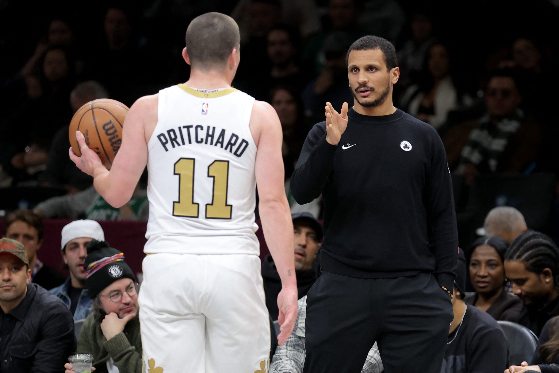 Jan 23, 2026; Brooklyn, New York, USA; Boston Celtics head coach Joe Mazzulla talks to guard Payton Pritchard (11) during the first quarter against the Brooklyn Nets at Barclays Center. Mandatory Credit: Brad Penner-Imagn Images