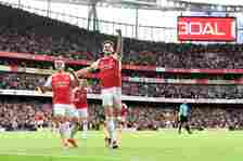 Leandro Trossard of Arsenal celebrates scoring his team's second goal with teammate Declan Rice during the Premier League match between Arsenal FC ...
