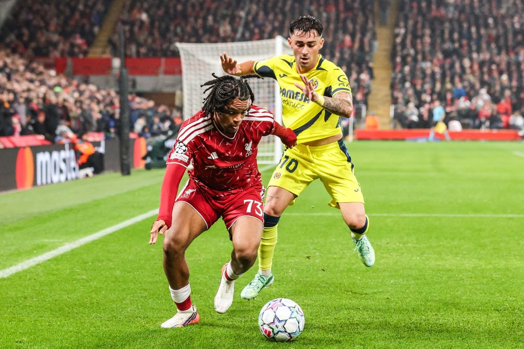 Rio Ngumoha of Liverpool holds off Alberto Moleiro of Villarreal.