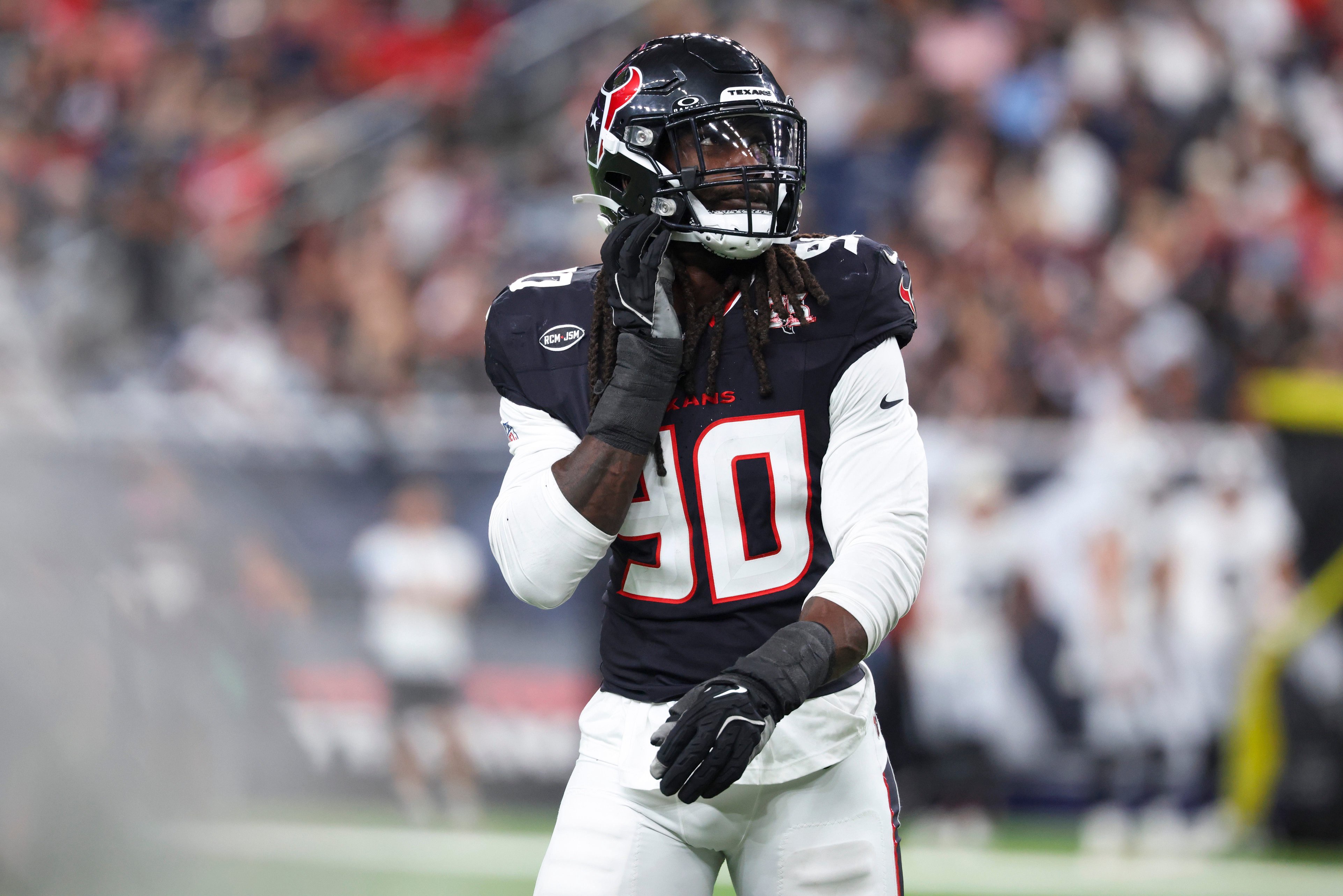 Aug 20, 2026; Houston, Texas, USA;  Houston Texans defensive end Jadeveon Clowney (90) walks off the field during the game against the Las Vegas Raiders at Reliant Stadium. Mandatory Credit: Troy Taormina-Imagn Images