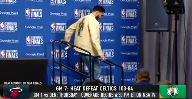 He needed to support himself walking down steps after his post-game media conference