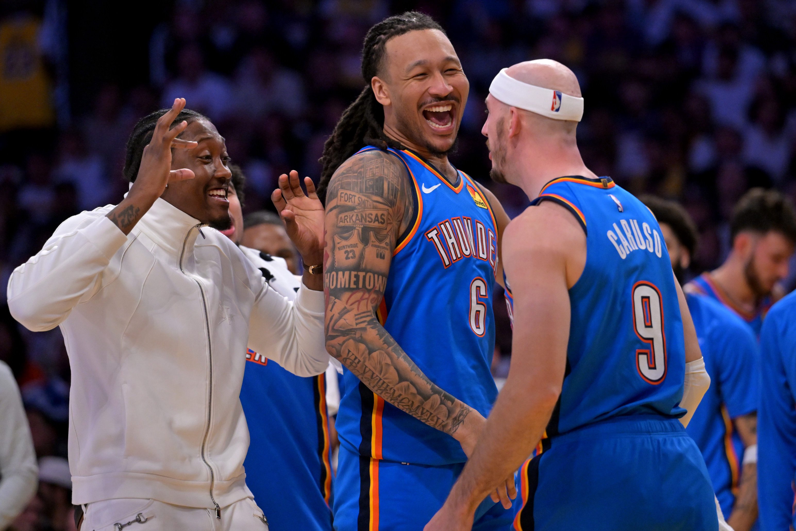 May 9, 2026; Los Angeles, California, USA; Oklahoma City Thunder guard Jalen Williams (8), forward Jaylin Williams (6) celebrate with Oklahoma City Thunder guard Alex Caruso (9) after a basket in the second half of game three of the second round of the 2026 NBA Playoffs against the Los Angeles Lakers at Crypto.com Arena. Mandatory Credit: Jayne Kamin-Oncea-Imagn Images
