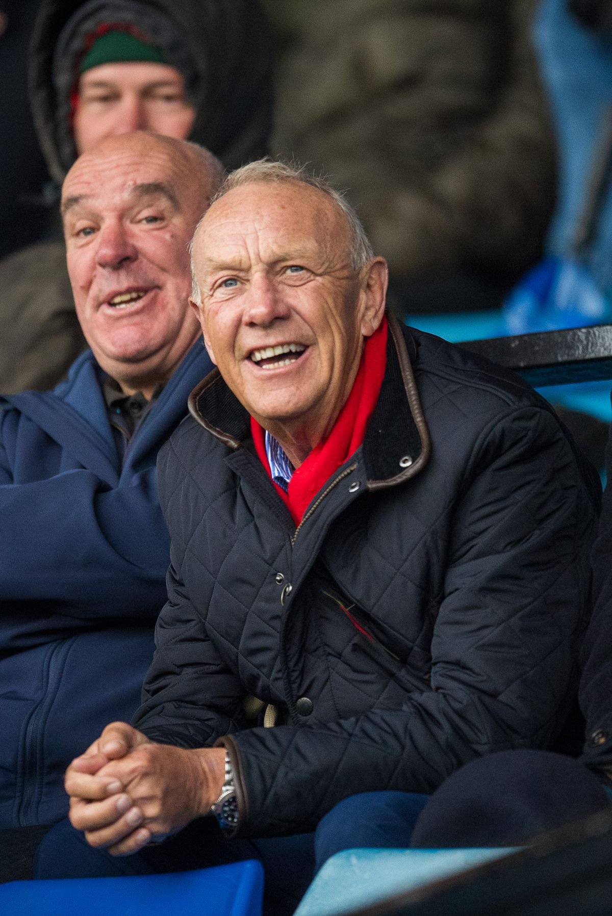 WRU chairman Lyndon Faulkner watches the game from the stand