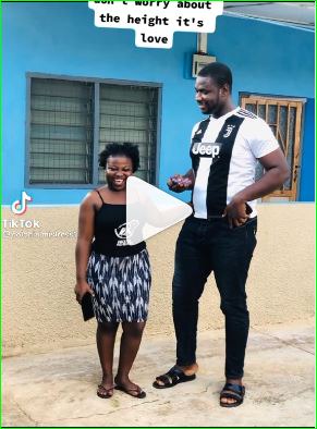 Don't worry about the height, Its love: Reaction as video of a lady and her boyfriend pops up