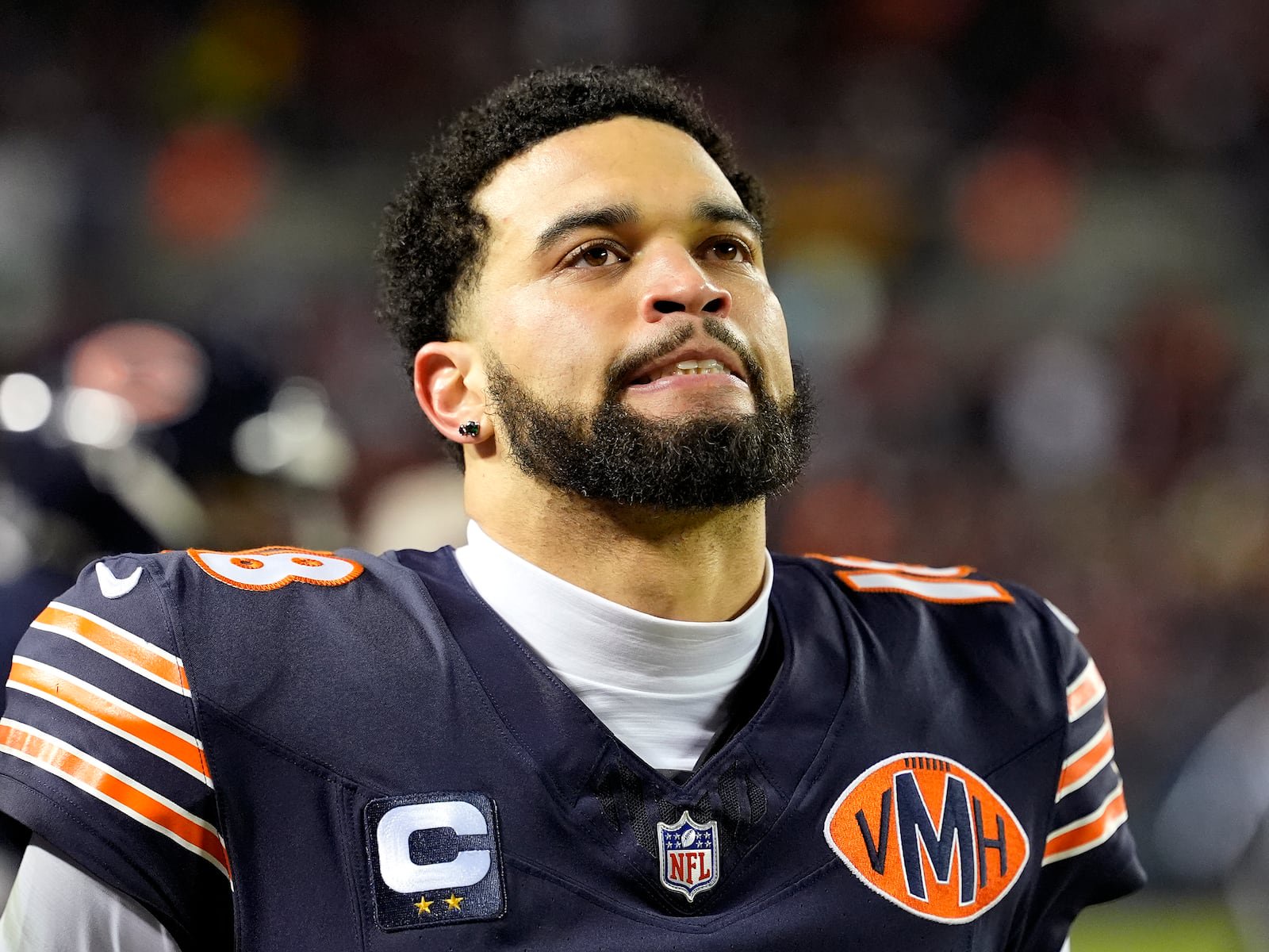 Caleb Williams #18 of the Chicago Bears reacts against the Green Bay Packers during the fourth quarter in the NFC Wild Card Playoff game at Soldier Field on January 10, 2026, in Chicago, Illinois.