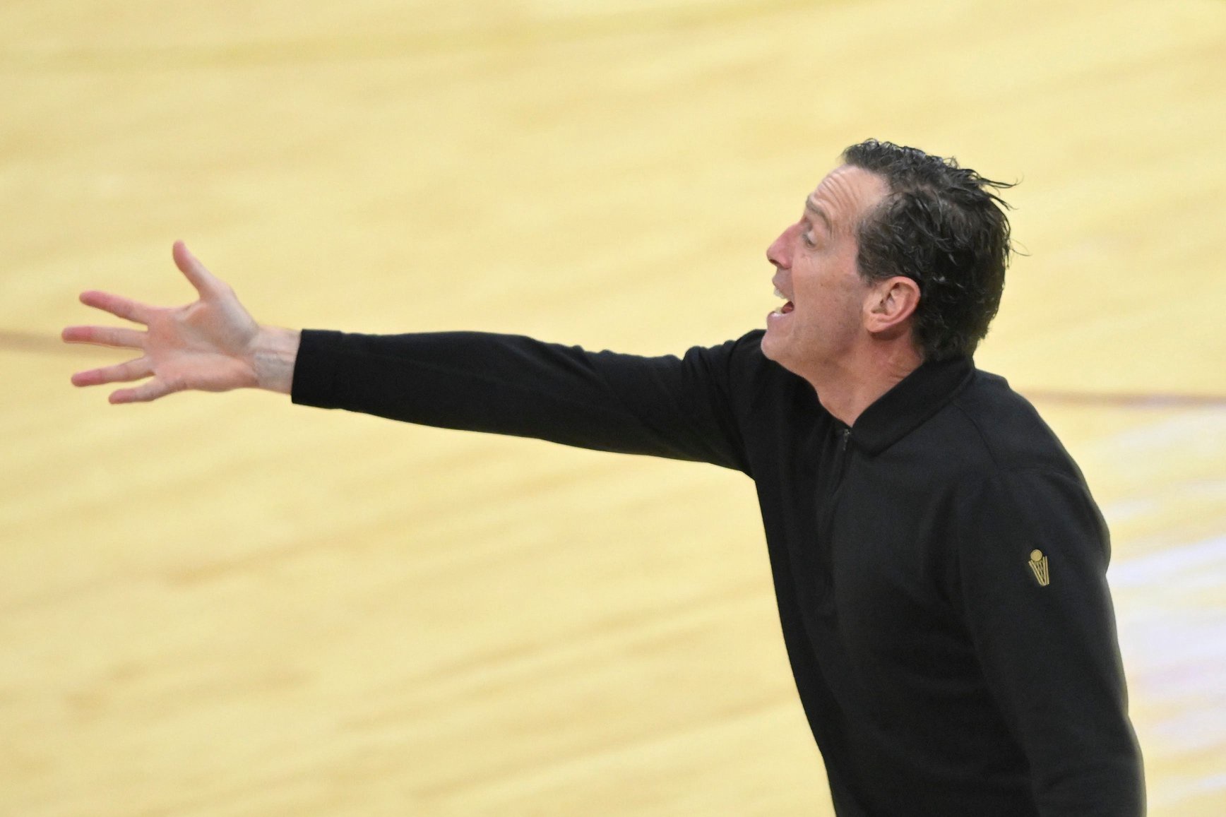 Cleveland Cavaliers coach Kenny Atkinson shouts across the court against the Minnesota Timberwolves on Oct. 26, 2026, in Cleveland.