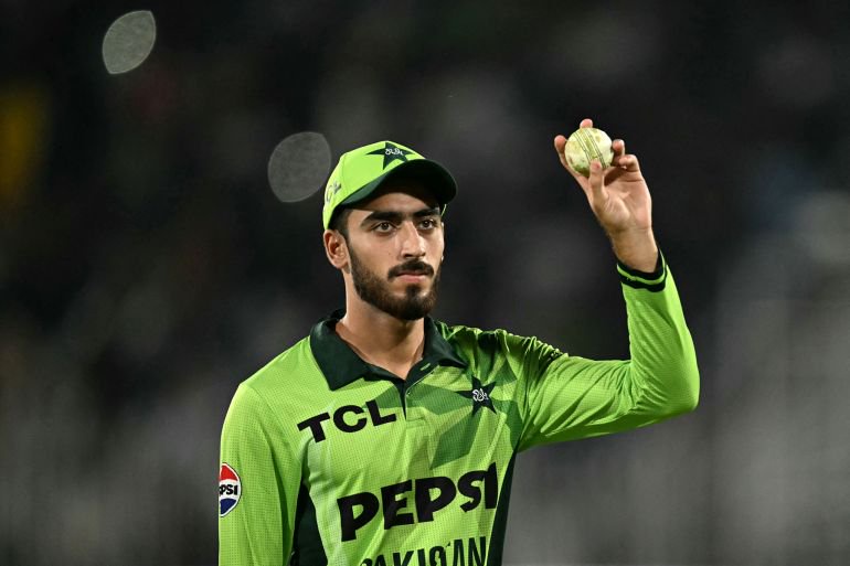 Pakistan's Arafat Minhas shows the ball after taking a five-wicket haul during the first one-day international (ODI) cricket match between Pakistan and Australia at the Rawalpindi Cricket Stadium in Rawalpindi on May 30, 2026. (Photo by Aamir QURESHI / AFP)
