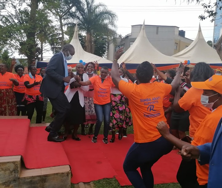 Dagoretti North MP Simba Arati joins supporters in a jig at the St Vincent Pastoral Centre in Kisii town.