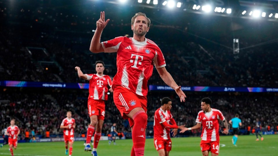 Bayern's Harry Kane celebrates after scoring a penalty, the opening goal of his team during the Champions League semifinal first leg soccer match between Paris Saint-Germain and Bayern Munich in Paris (AP Photo/Christophe Ena)