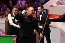 Stephen Maguire celebrates beating Shaun Murphy at the Cazoo World Snooker Championship 2024