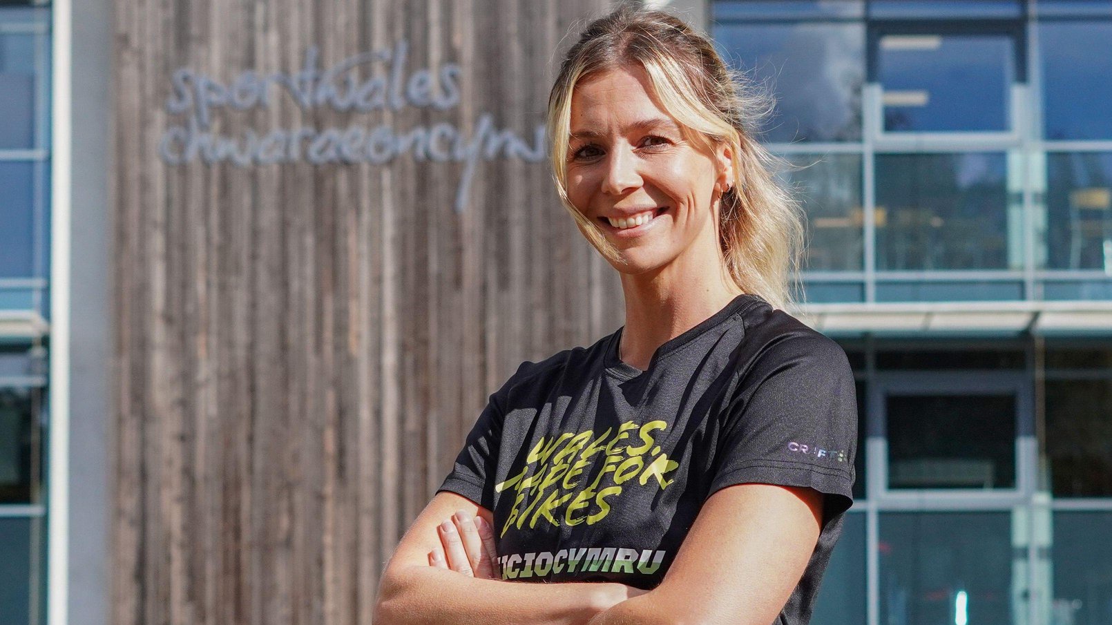 Becky North smiles outside Sport Wales in Cardiff