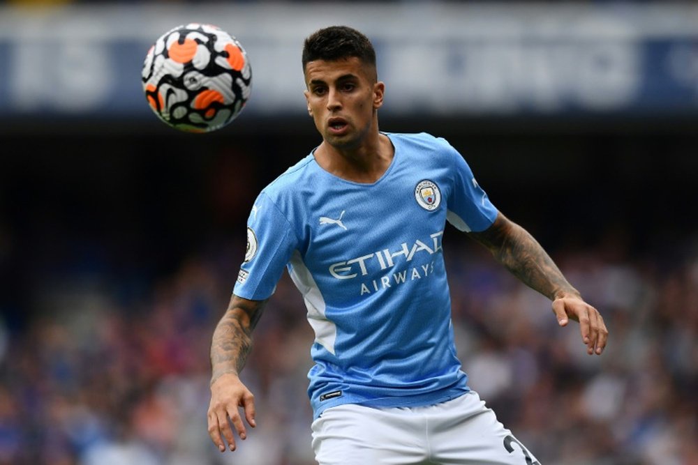 Manchester City defender Joao Cancelo renews his contract. AFP