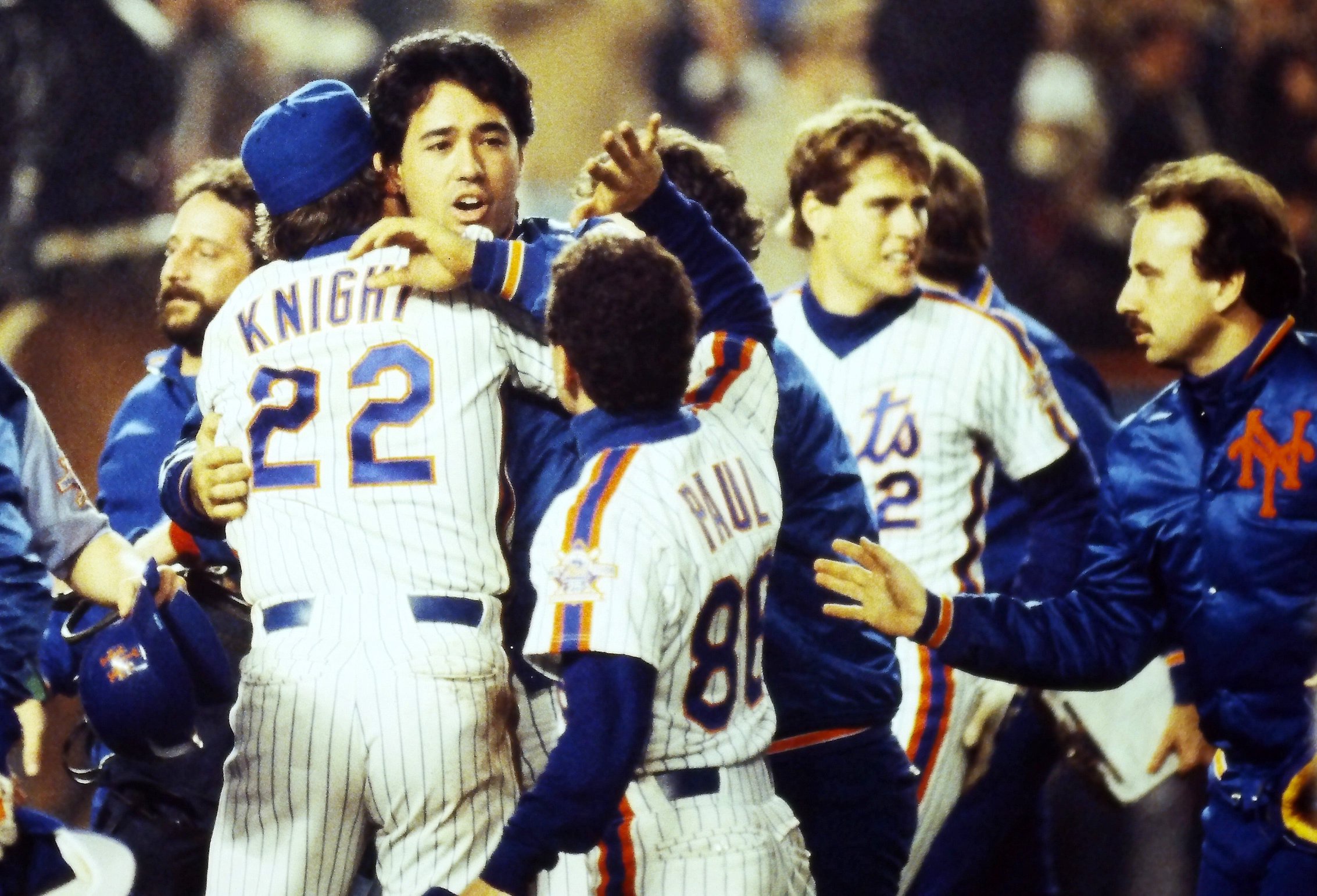 The New York Mets celebrate on the field after defeating the Boston Red Sox in Game 7 of the 1986 World Series at Shea Stadium on Oct. 27, 1986.