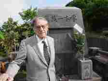 This July 21, 2012, photo shows Donald Keene during a visit to Ishikawa Takuboku's family grave in Hakodate, Hokkaido. (Provided by the Donald Keene Memorial Foundation)