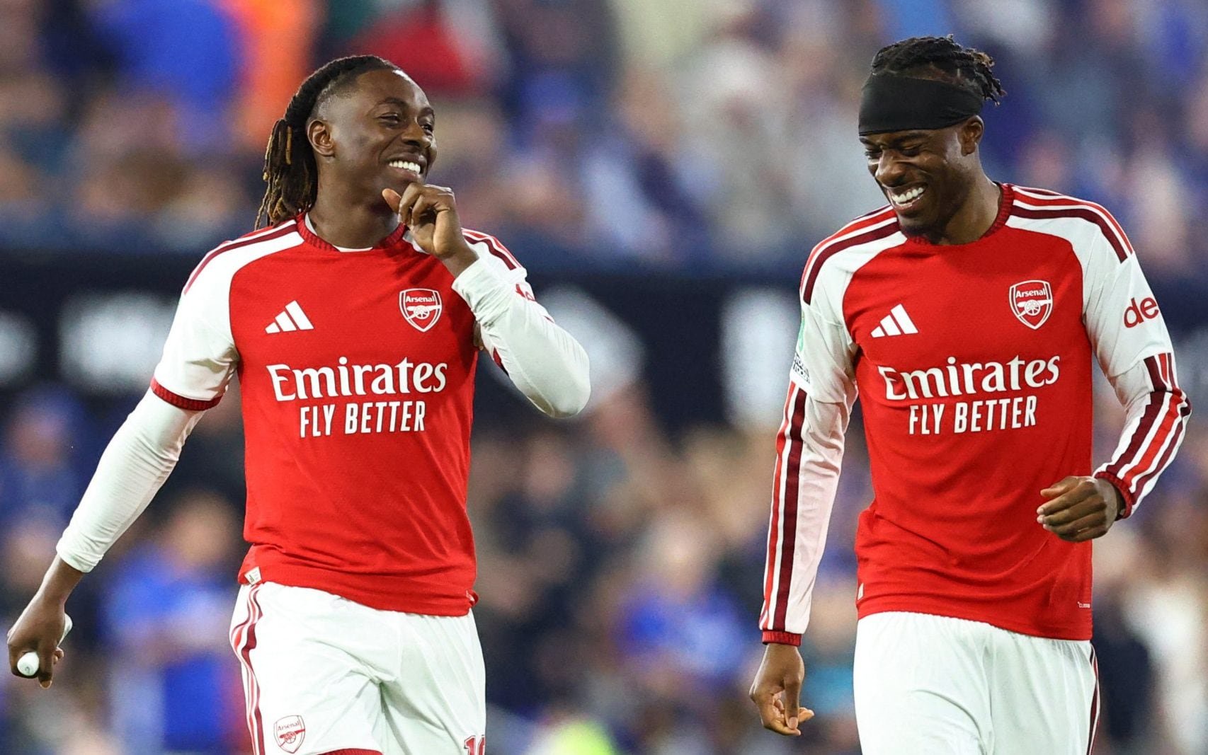 Eberechi Eze and Noni Madueke (right) share a laugh