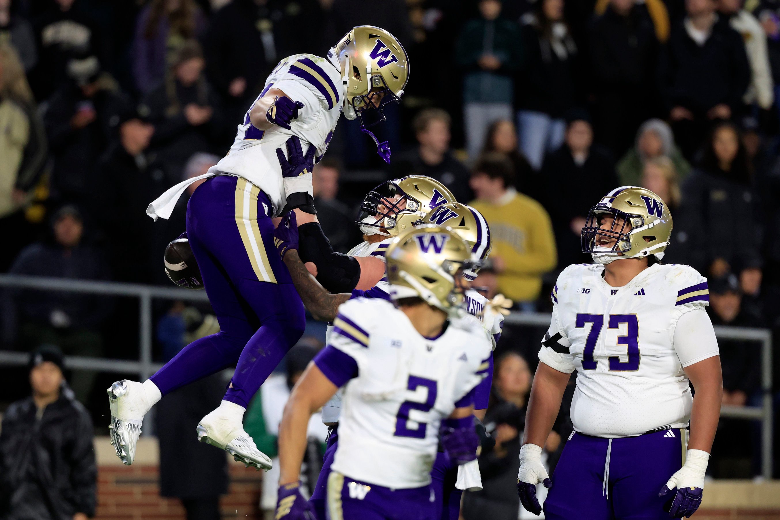 Brian Bonner of the Washington Huskies celebrates a touchdown with teammates during the second quarter against the Purdue Boilermakers at Ross-Ade Stadium on October 16, 2026 in West Lafayette, Indiana.