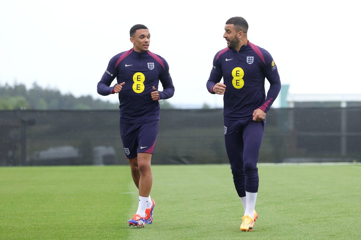 BLANKENHAIN, GERMANY - JUNE 14: Trent Alexander-Arnold and Kyle Walker of England talk during a training session at Spa & Golf Resort Weimarer Land on June 13, 2024 in Blankenhain, Germany. (Photo by Eddie Keogh - The FA/The FA via Getty Images)