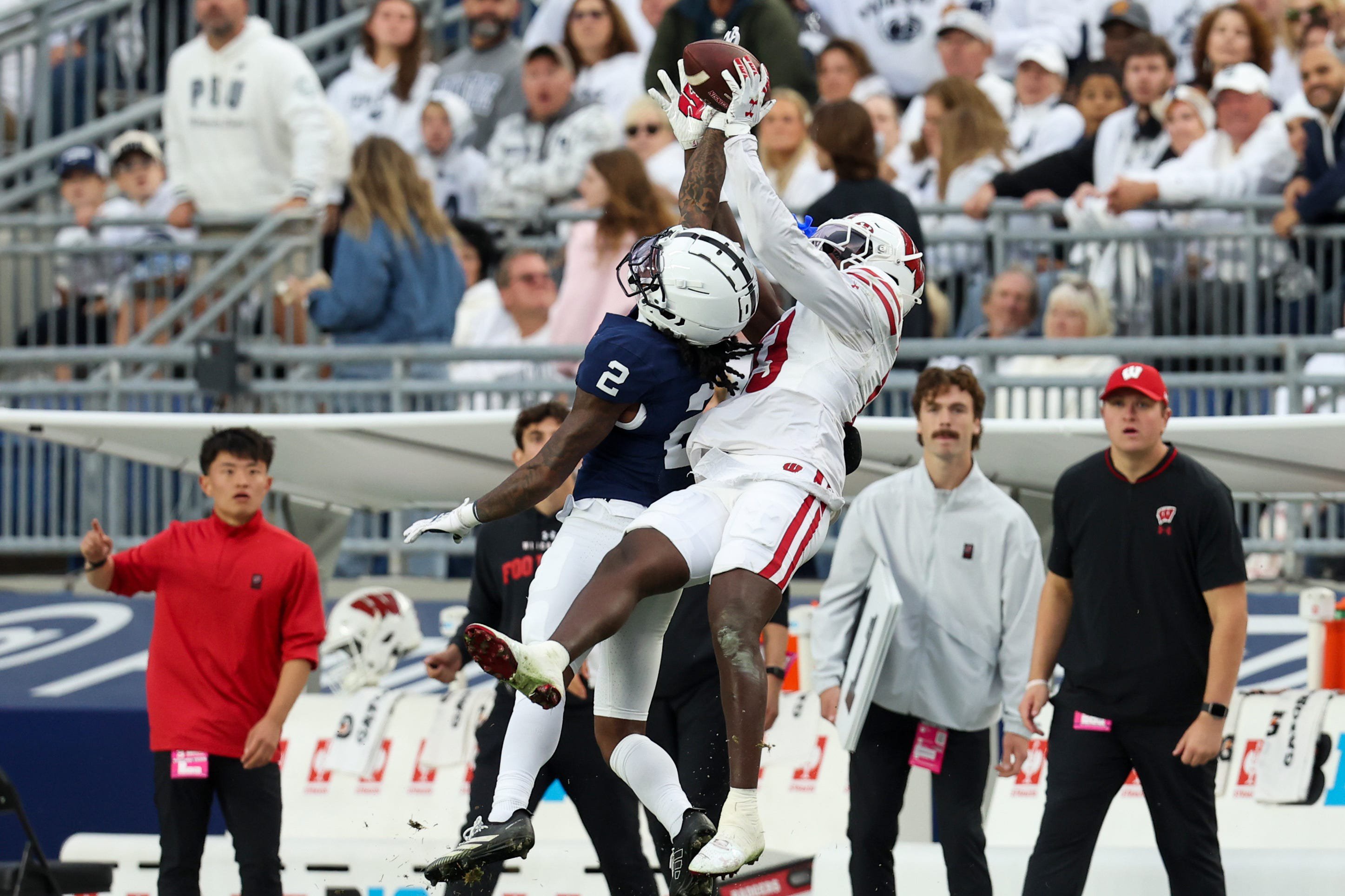 Sep 26, 2026; University Park, Pennsylvania, USA;  Penn State Nittany Lions cornerback Audavion Collins (2) breaks up a pass intended for Wisconsin Badgers wide receiver Eugene Hilton Jr. (13) during the second quarter of the game at West Shore Home Field at Beaver Stadium.  Mandatory Credit: Matthew O'Haren-Imagn Images