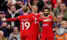Liverpool's Mohamed Salah (right) celebrates with Darwin Nunez and Harvey Elliott after scoring at Anfield