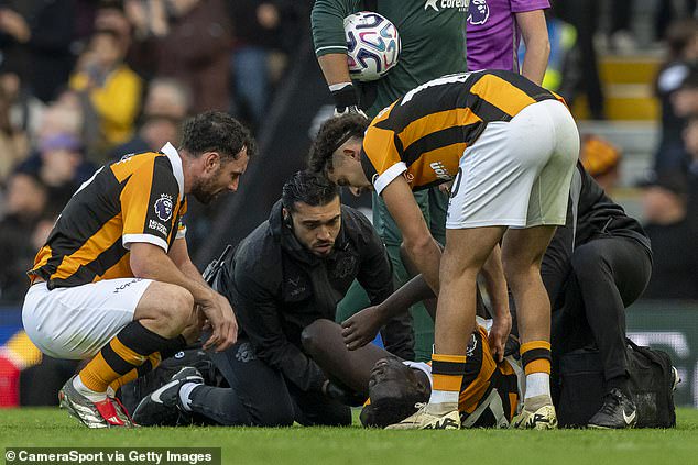 Hull substitute Robinio Vaz receives treatment on a dispiriting afternoon for the Tigers