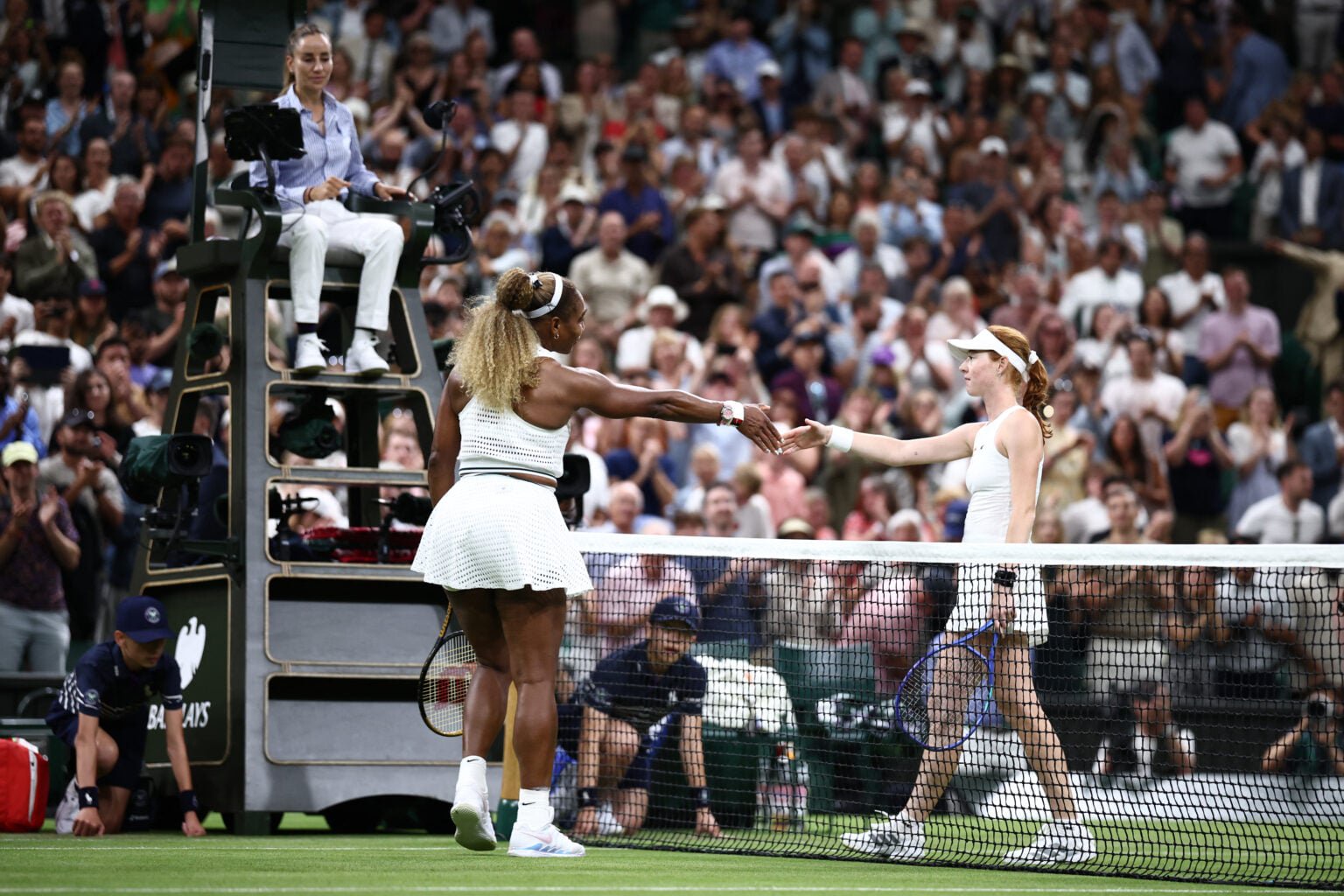 Serena Williams and Maya Joint shake hands.