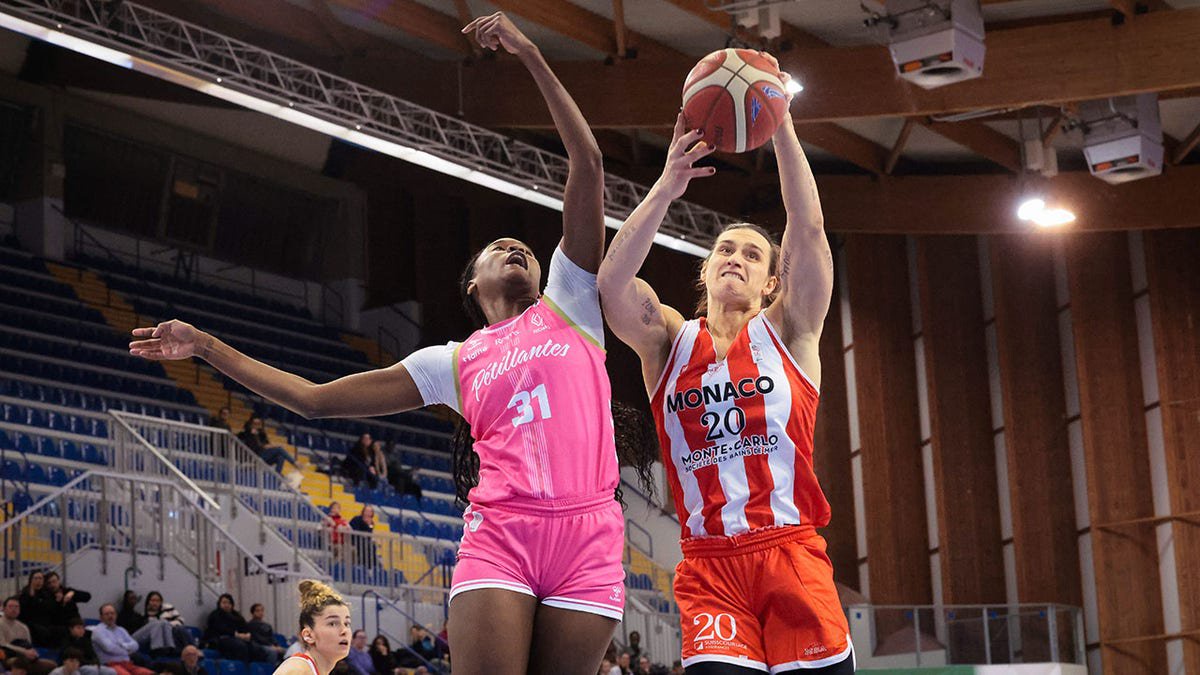 Julie Tetart, a transgender player for Monaco, plays basketball during a French second-division game in Reims, France.