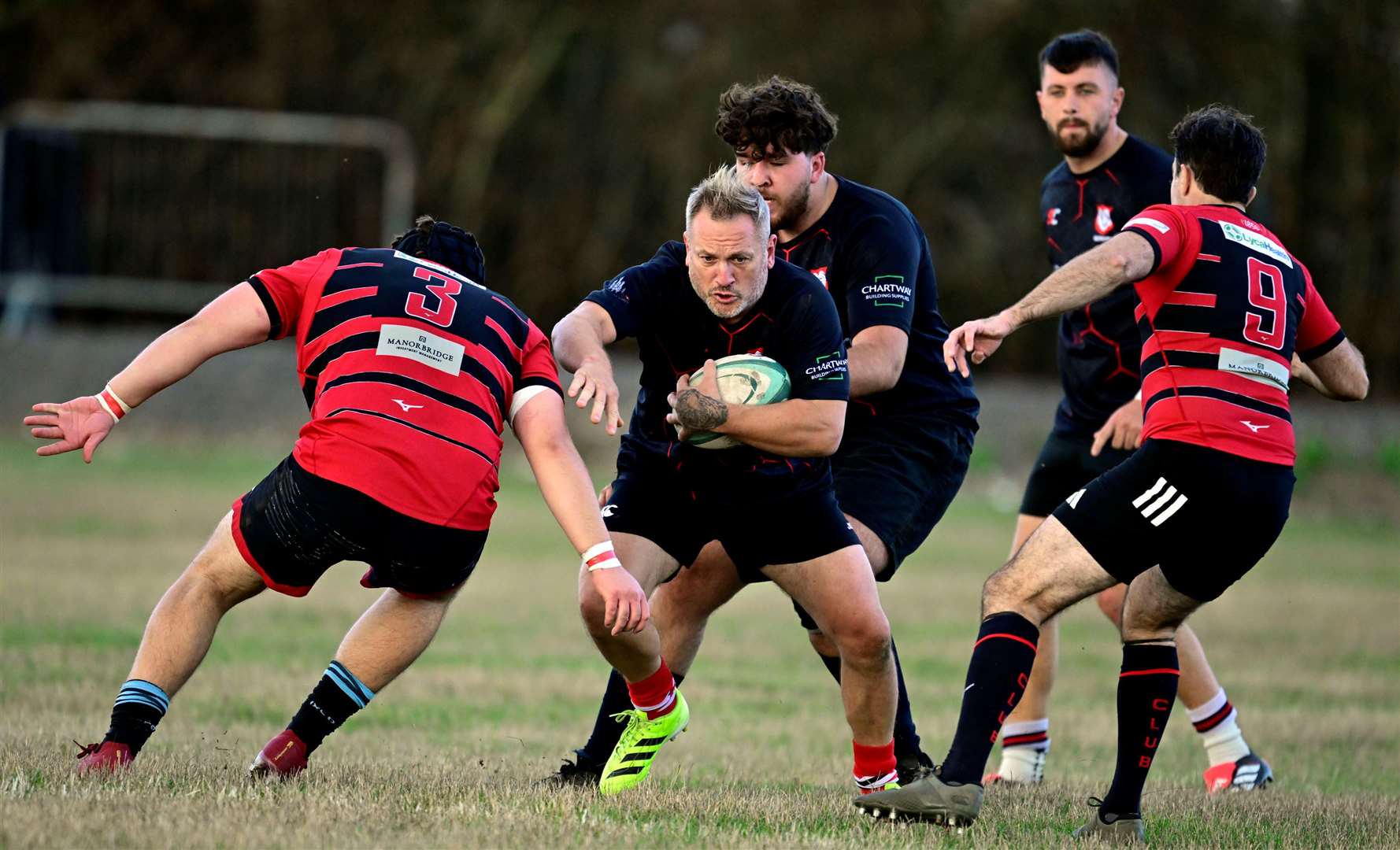 Jim Susans looks to break through for Sheppey on a tough day against Blackheath 3rds. Picture: Barry Goodwin