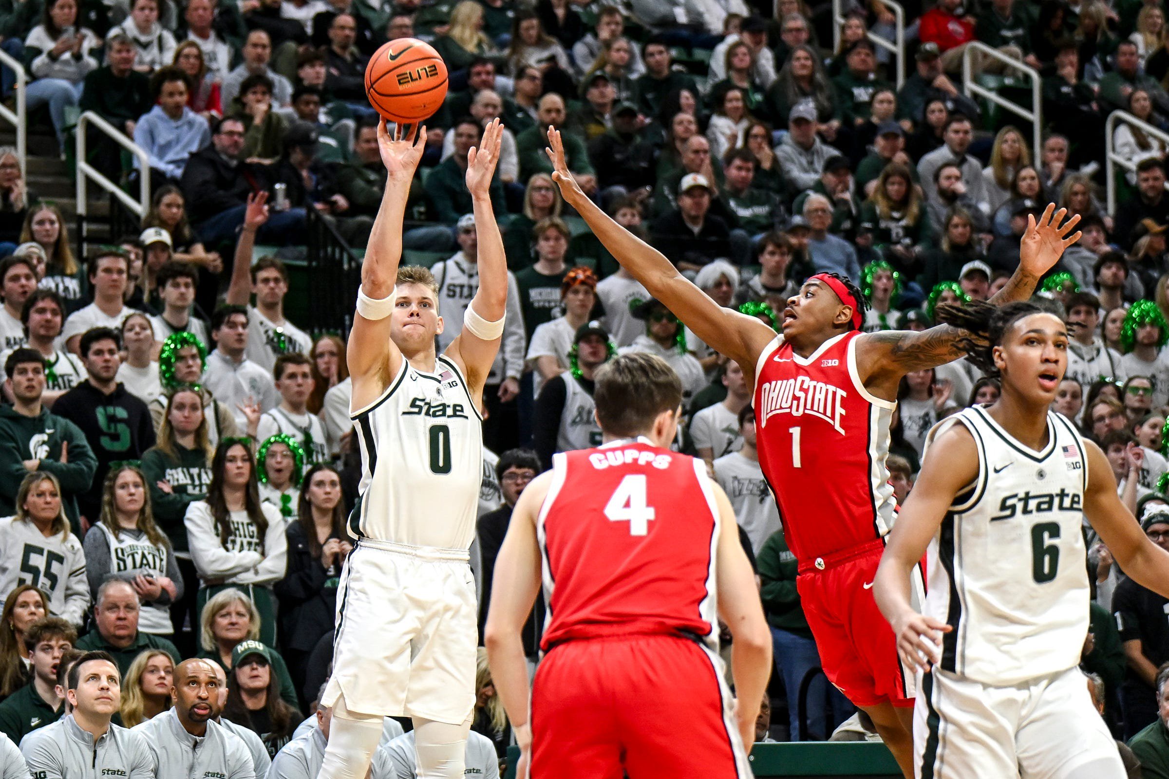 Michigan State's Jaxon Kohler, left, shoots as Ohio State's Amare Bynum defends during the second half on Sunday, Feb. 22, 2026, at the Breslin Center in East Lansing.